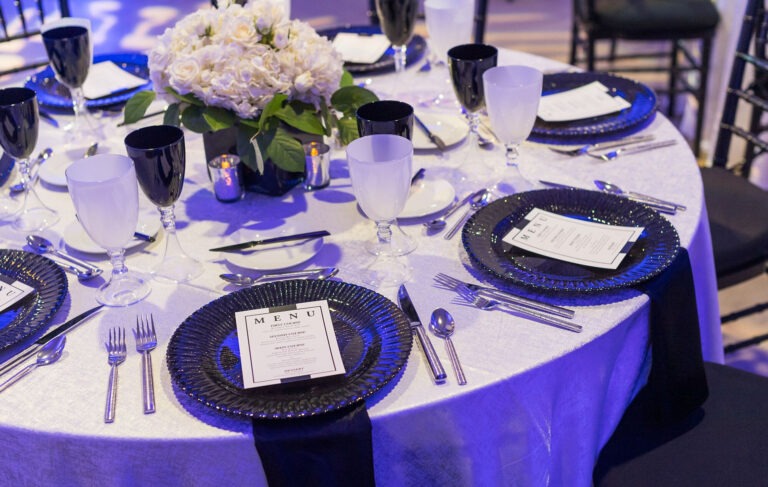 table setting at event planned by cid